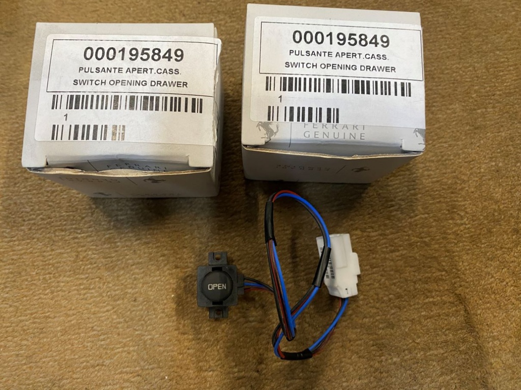 Bouton d'ouverture de la boîte à gants